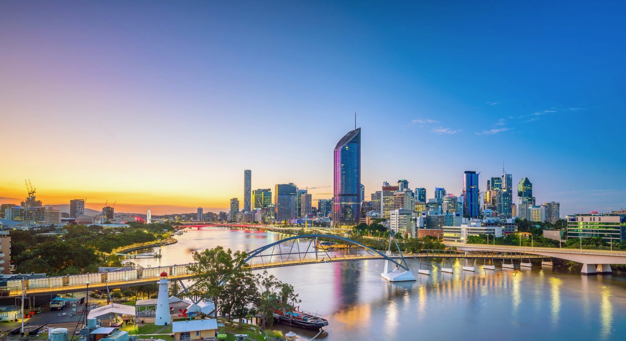 Brisbane skyline at dusk — backdrop for Represent Commercial, a Brisbane commercial property management firm