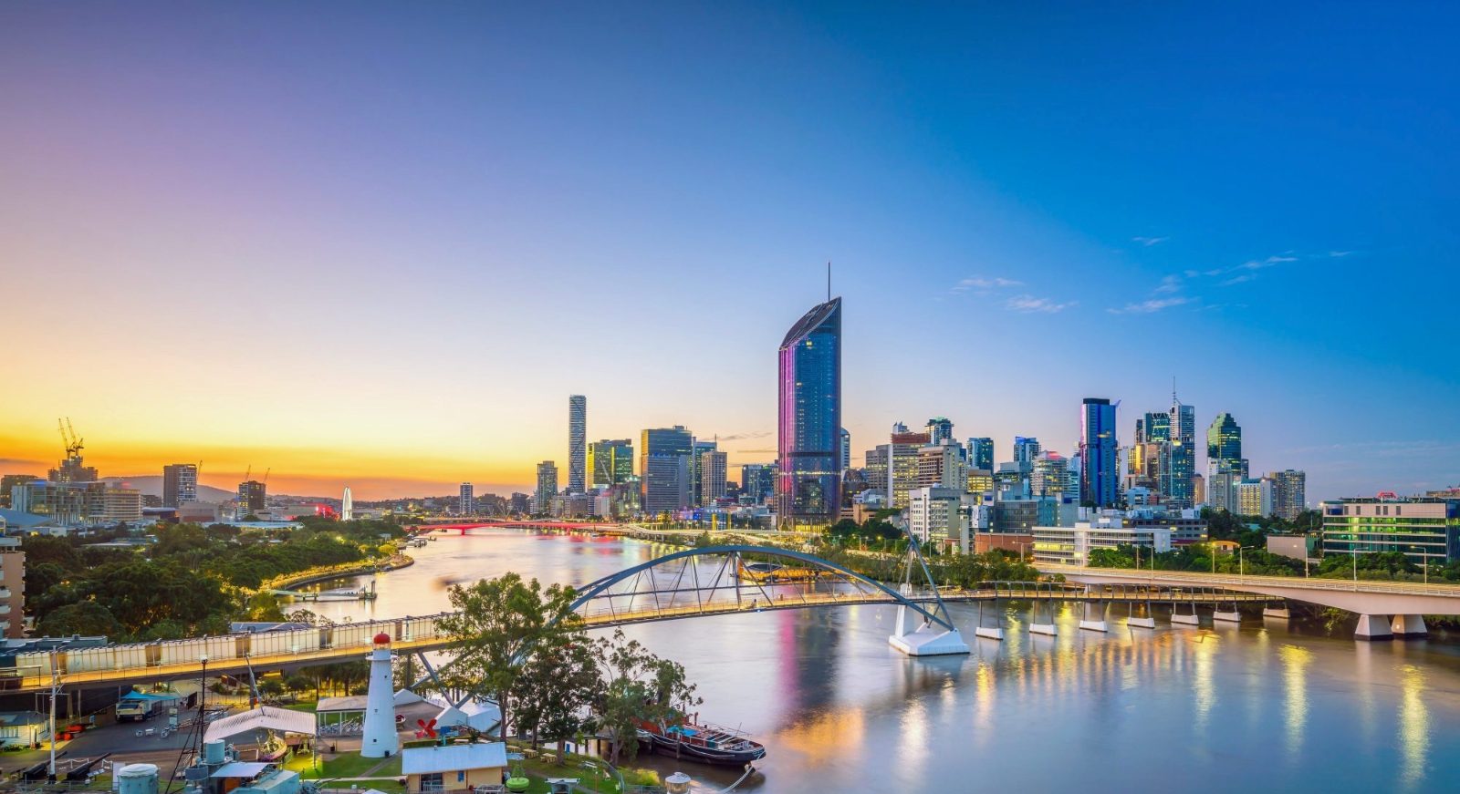 Brisbane skyline at dusk — backdrop for Represent Commercial, a South East Queensland commercial property management firm
